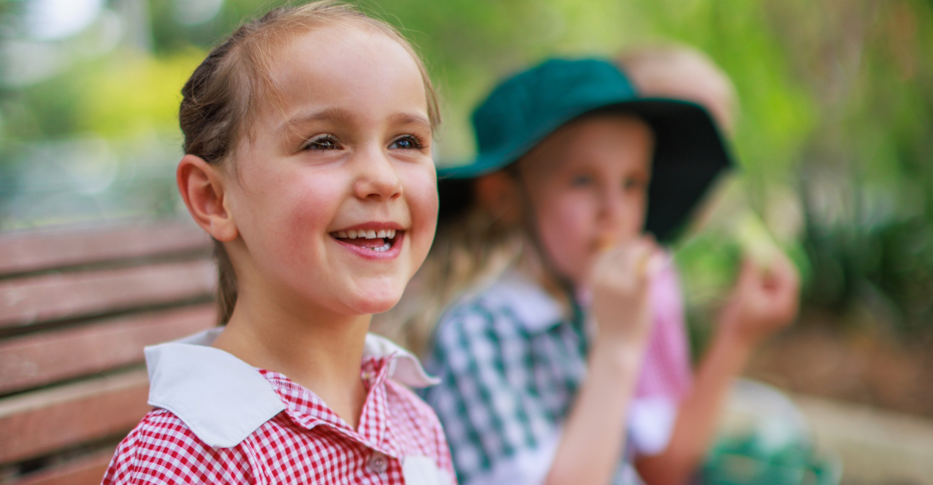 Kids holding a lunchbox