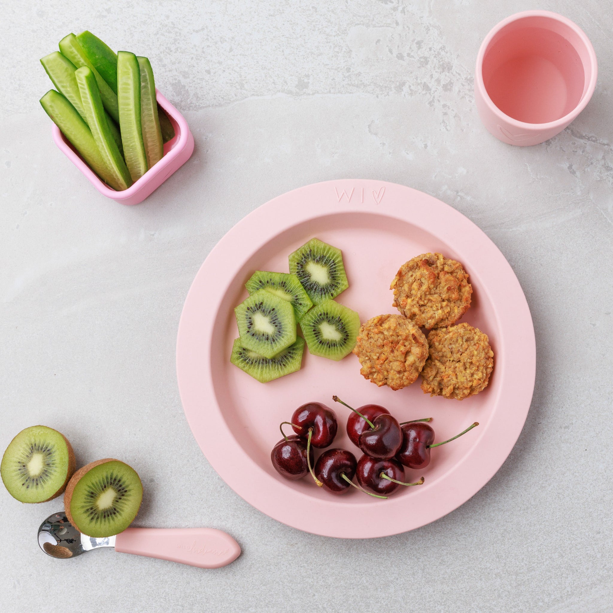 A plate of Apple & Carrot Mini Muffins served with fruit from Audrey and Alfie's Finger Food Range