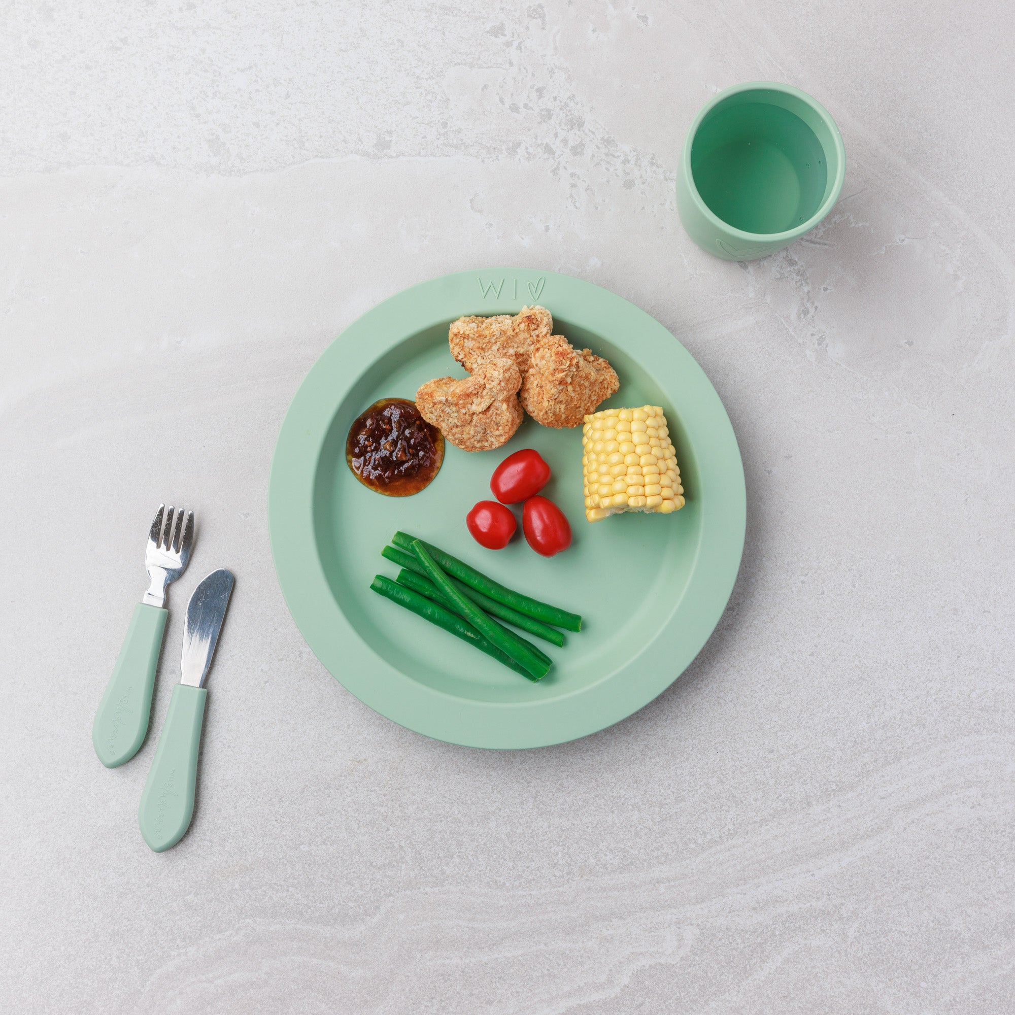 Audrey and Alfie's chicken nuggets with hidden veg, served with corn, tomatoes and beans