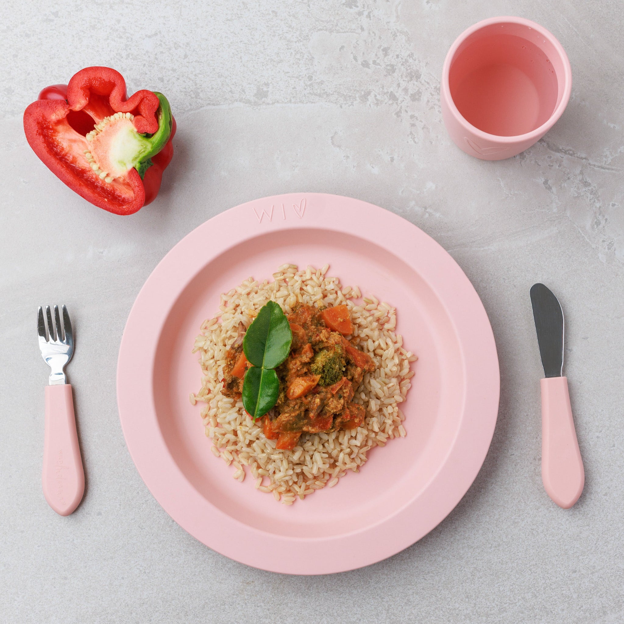 A plate of slow cooked beef rendang with organic brown rice from Audrey and Alfie's Bowl Range