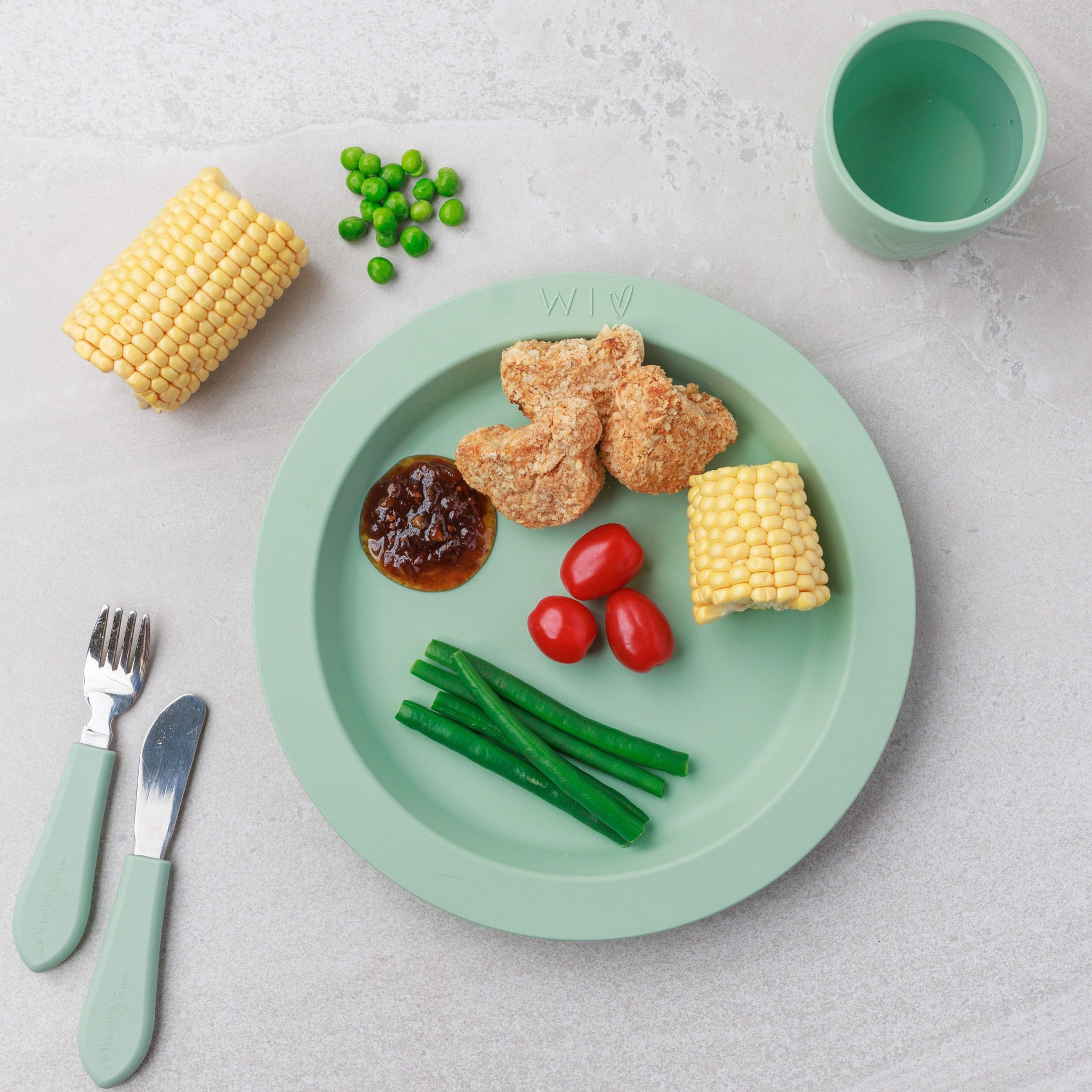 A plate of Chicken Nuggets with Hidden Veggies, served with veggies from Audrey and Alfie's Finger Food Range