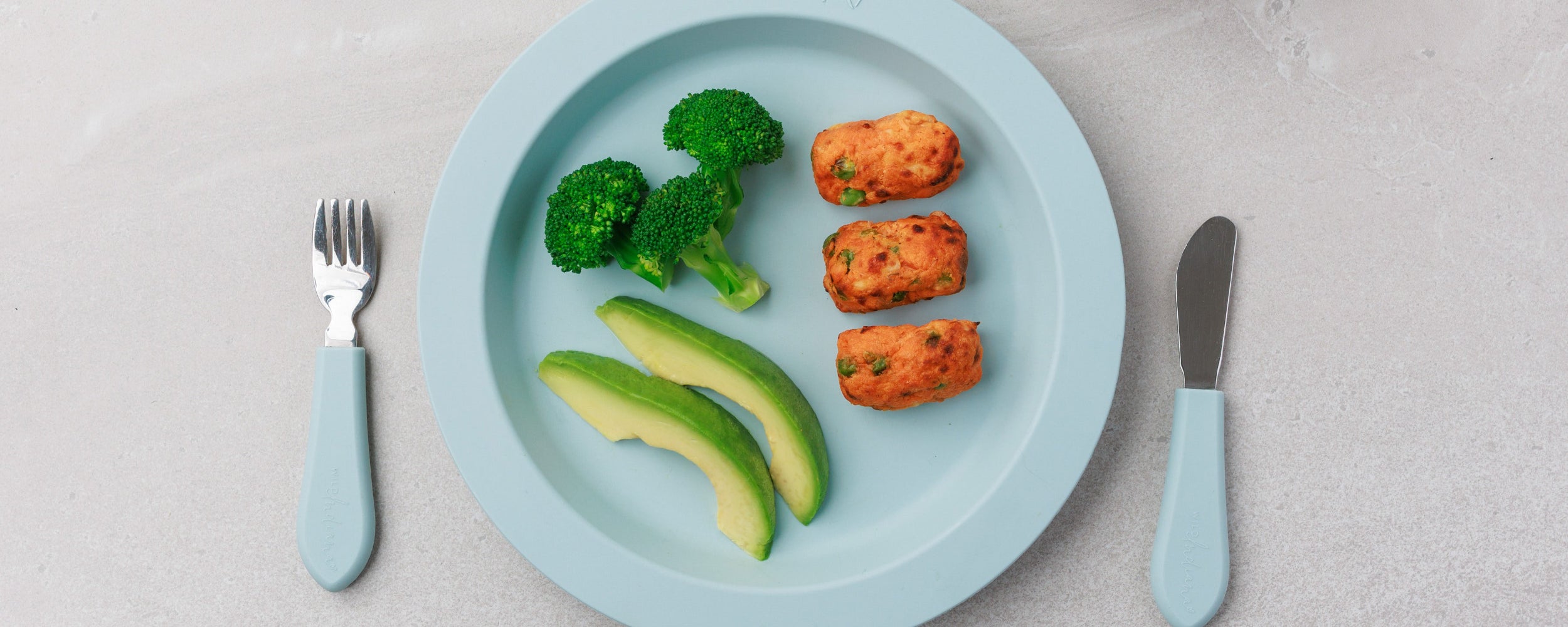 A plate of Sweet Potato Salmon Bites from Audrey & Alfie's Finger Food Range, with Veggie Sides