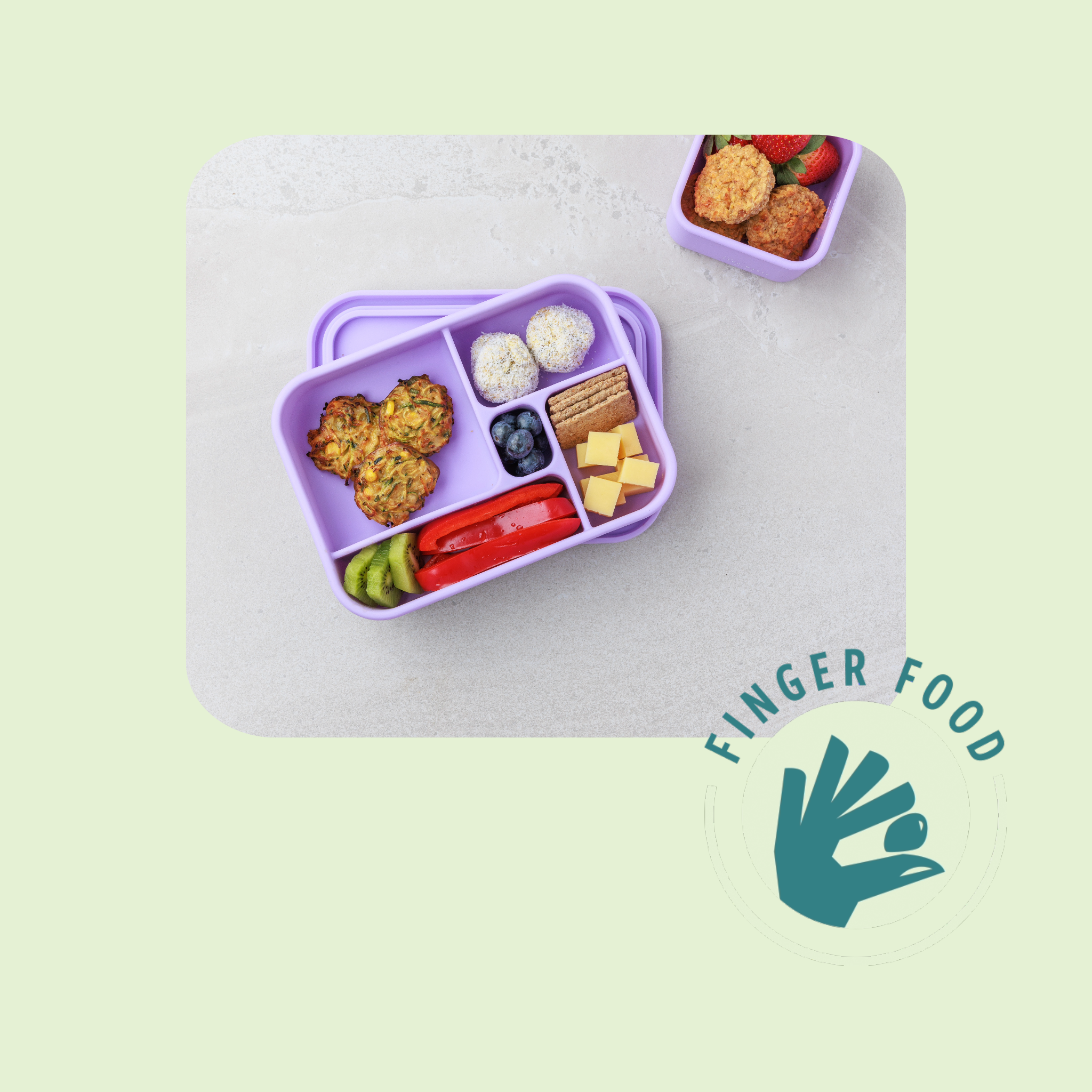 Lunchbox with Nutritious snacks for Toddlers and Children, as part of Audrey and Alfie's Finger Food Range. Including Raspberry Bircher Bites, Zucchini & Corn Fritters and Apple and Carrot Muffins. 