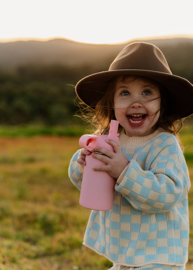 Toddler drinking from The Zero Waste People's Water Bottle